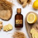 Dsquared2 Wood Pour Homme Eau de Toilette 100 ml Profumo Uomo Dsquared2 Wood Pour Homme Eau de Toilette 100 ml con flacone su sfondo con limone, zenzero e legni, profumo da uomo dalle note legnose, agrumate e speziate.
