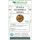 Tè aromatizzato con pezzetti di mandorla amara Tè aromatizzato con pezzetti di mandorla amara